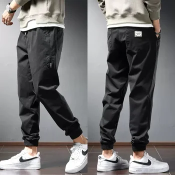 Neforemné Ceruzka Bežné Nohavice Muži Jeseň Streetwear Módy Čierne plátenné Nohavice Elastický Pás CP1970